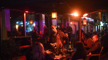 Last orders: Pubs and restaurants across England were on Wednesday preparing to close.