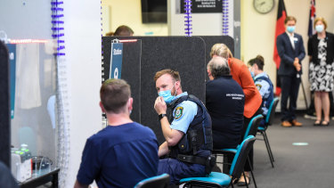 Emergency/medical workers register to have the vaccine shot at RPA Hospital in Sydney.