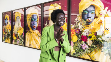 Atong Atem with the self-portrait that won the Art Gallery of NSW’s new La Prairie Art Award. 