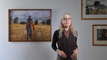 Photo media artist Anne Zahalka in front of her work earlier this year.