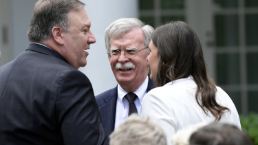 Secretary of State Mike Pompeo (left) and national security adviser John Bolton (right) have been making preparations with Trump.