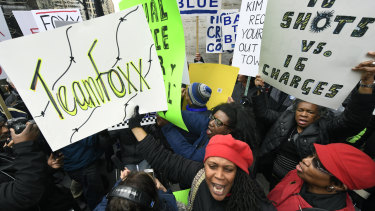 Duelling protesters clash last week over the decision to drop charges against Smollett.
