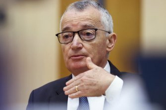 Australia Post chair Lucio Di Bartolomeo told a Senate estimates hearing on Tuesday that former chief executive Christine Holgate had “reluctantly” agreed to stand aside in October last year pending an investigation into her decision in 2018 to spend $20,000 on Cartier watches for four employees.