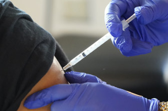 A resident receives a Pfizer booster shot  in Jackson, Mississippi, US.
