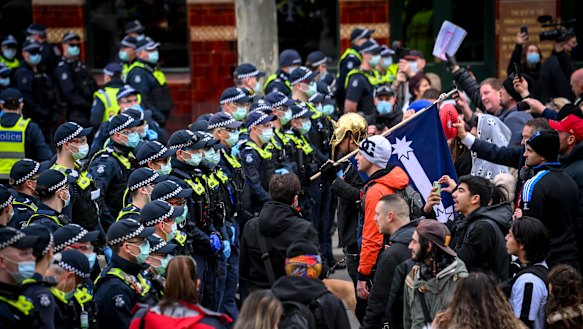 Police and protesters come face to face on Saturday.