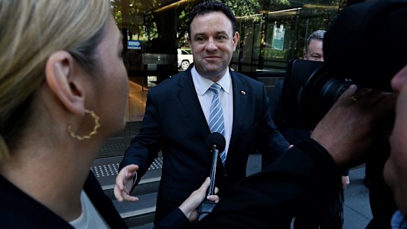 NSW Deputy Liberal Leader and Minister for jobs Stuart Ayres (centre) leaves ICAC.