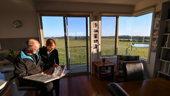 Retired couple Robert Newall and wife Karen in front of the farmland at Ventnor, Phillip Island, which had been rezoned by the former Planning Minister Matthew Guy.