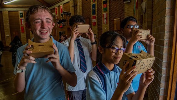 Doonside Technology High School students Harrison Try, Emily Yaneza, Alain Bidar  and Ruhit Saha viewing virtual reality during the STEM program. 