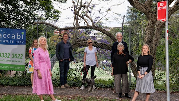 Woollahra councillor Harriet Price (second from left) and local residents outside the White City tennis centre.