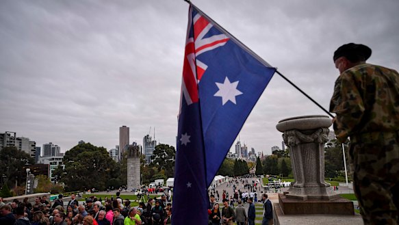 People gather at the Shrine of Remembrance in Melbourne for the Anzac Day dawn service.