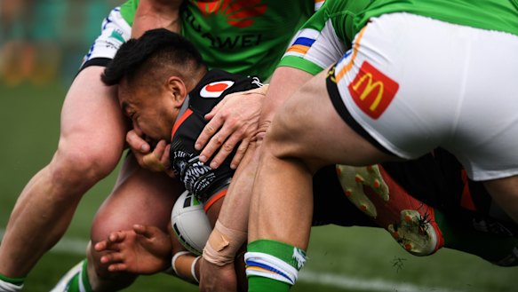 Footage shows Hudson Young of the Raiders with his hand in the face of Adam Pompey.