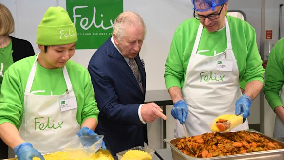 A recent photo of Charles pointing to a dish that is no doubt ten times better than Coronation Quiche.