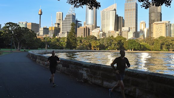 Joggers at the Royal Botanic Gardens in Sydney.