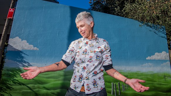 Andrea Phelan, 61, shows off her two tattoos. Getting a tattoo in your 60s and 70s is becoming more common, tattoo artists say.