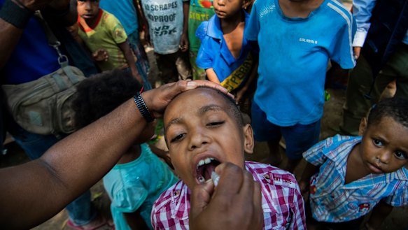 Polio vaccinations are conducted at the 8 Mile Settlement in Port Moresby.