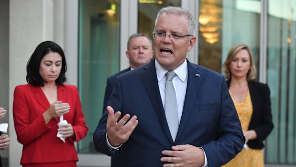 Prime Minister Scott Morrison speaks at the  candlelight vigil.