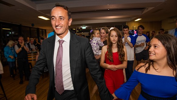Dave Sharma and his family as results came in on Saturday night. 