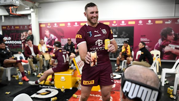 Kurt Capewell walks around the dressing room after the game with Cameron Munster on FaceTime.
