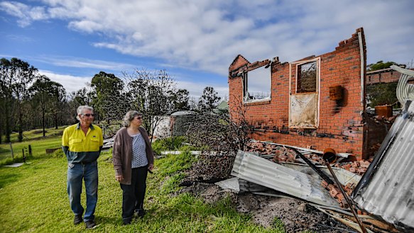 Lyn and Allan Wallwork are living in their shed while waiting for the removal of their destroyed Sarsfield home.