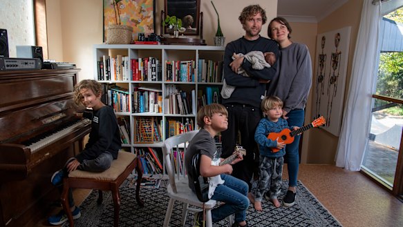 Bec Secomb and newborn daughter Lulu Margaret with husband Josh and children Archer Bailey, 8, Jack Wilde, 6, and Cohen Cash, 3, at their Bilgola Heights home.