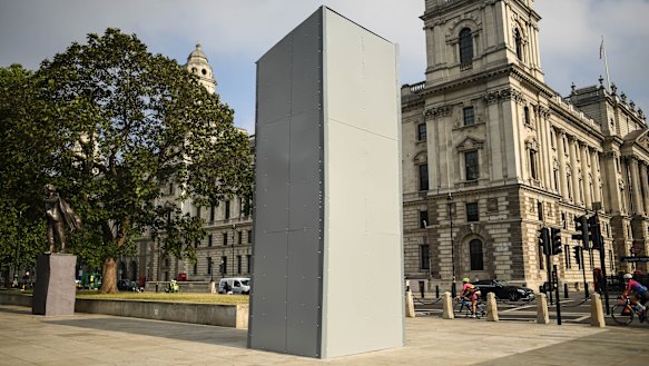 A protective barrier around the statue of Winston Churchill in Parliament Square. 