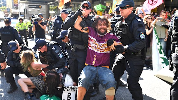 Protesters arrested as they blocked the corner of Queen and Edward streets.