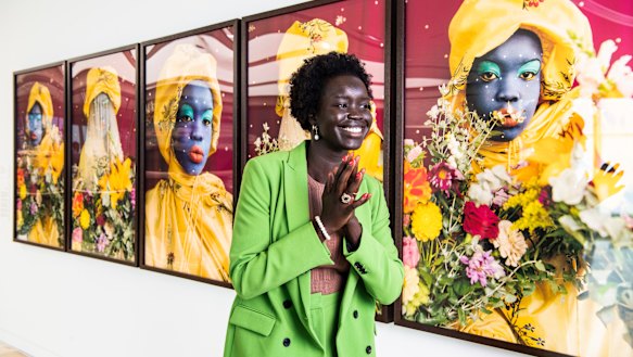 Atong Atem with the self-portrait that won the Art Gallery of NSW’s new La Prairie Art Award. 