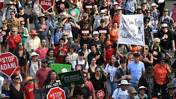 Thousands marched in the anti-Adani rally in Brisbane on Monday.