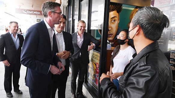 Out and about: Premier Perrottet, Minister Rob Stokes and MP Geoff Lee visit the revitalised Church St in Parramatta as the light rail is completed.