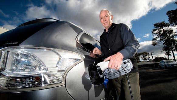 Paul Kirkpatrick  with his hybrid vehicle.