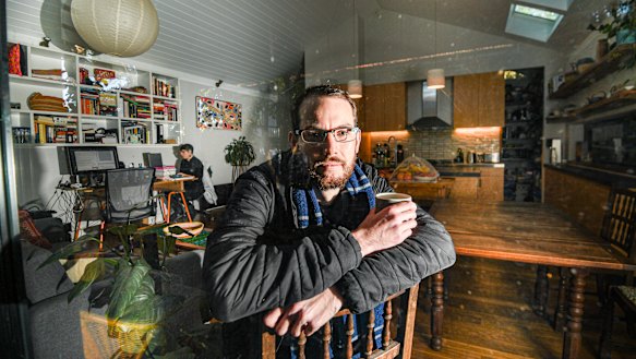 Michael Mazengarb and his partner wear jumpers, jackets, gloves and even blankets to stay warm in their Marrickville home.