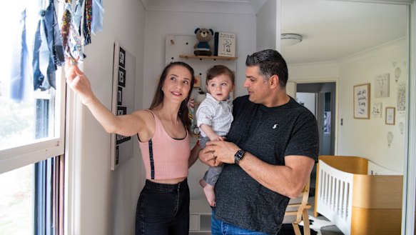 Danielle and Ray Rizk at home with their son George.