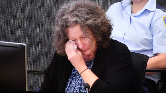 Kathleen Folbigg breaks down while being questioned about the deaths of her four children as she appears via video link, screened at the NSW Coroner's Court last year.