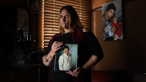 Annemarie Skratek holds a picture of her son Harley. 