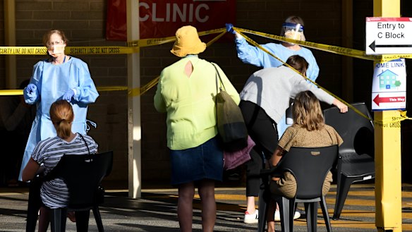 Lining up for a "fever clinic" at Sir Charles Gairdner hospital in Perth.