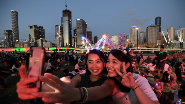 Mizuki (left) and Tsubasa waiting New Year's Eve fireworks at South Bank in Brisbane.