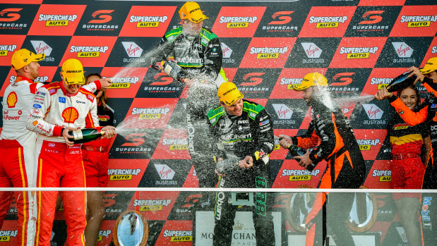 Seventh heaven: Craig Lowndes and Steven Richards celebrate at Bathurst on Sunday.