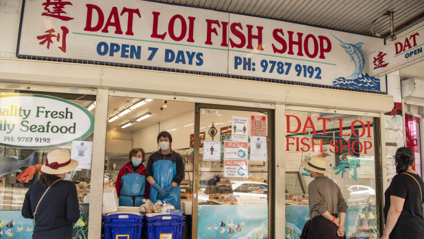 Ly Tran and her son Ray Tran at Dat Loi Fish Shop in Campsie 