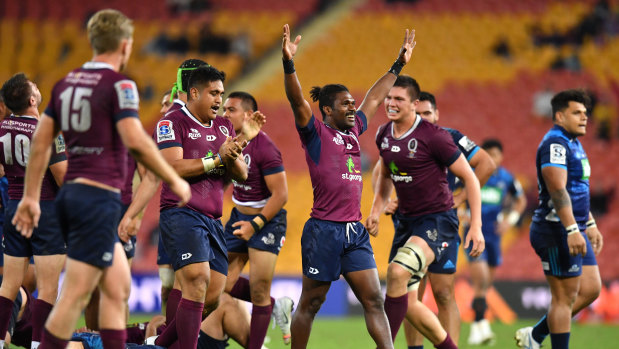 Red alert: The Queensland Reds celebrate the end of their drought against New Zealand teams.
