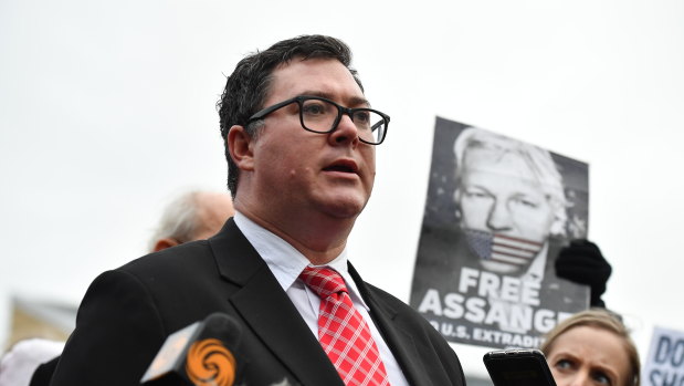 Australian politician George Christensen has flown to London to visit WikiLeaks founder Julian Assange in prison after calling on the UK to block his extradition to the US.