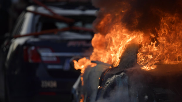 An Atlanta Police Department vehicle burns during a demonstration against police violence in Atlanta on Friday.
