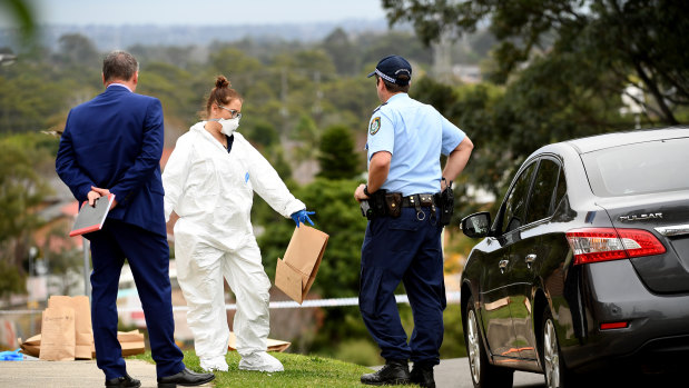 Forensic police work at the scene of the stabbing in Carlingford.