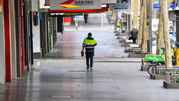 A deserted Swanston Street in Melbourne's central business district. Victoria's lockdown is hitting employment and business activity with forecasts up to 100,000 jobs nationally disappeared during August.
