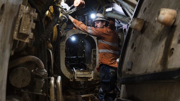 A worker operates the tunnel boring machine known as Kathleen, on the Sydney Metro tunnel.
