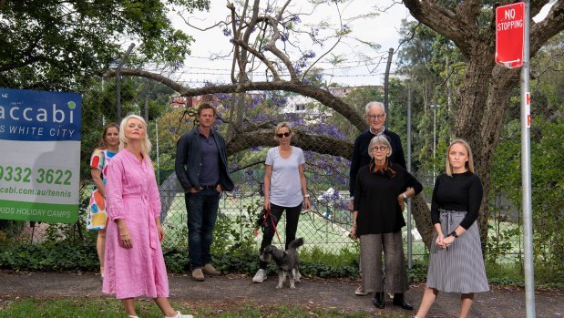 Woollahra councillor Harriet Price (second from left) and local residents outside the White City tennis centre.