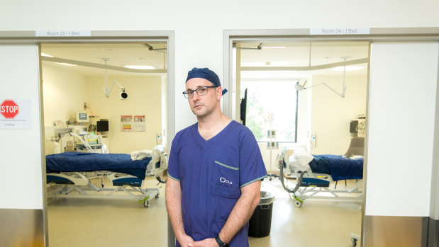 Associate Professor David Brewster, intensive care deputy director, outside two of the new intensive care rooms at  Cabrini hospital.