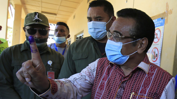 East Timor President Francisco “Lu Olo” Guterres casts his vote in the first round of the presidential elections.