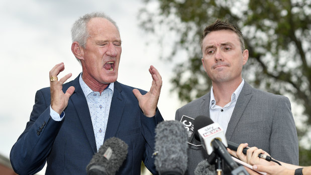 One Nation officials Steve Dickson and James Ashby answer questions at a press conference in Brisbane.