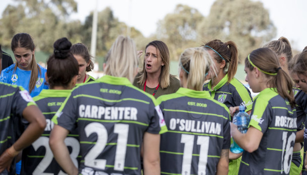 Canberra United coach Heather Garriock speaks to her team after they gave up a 4-1 lead to draw 4-4.