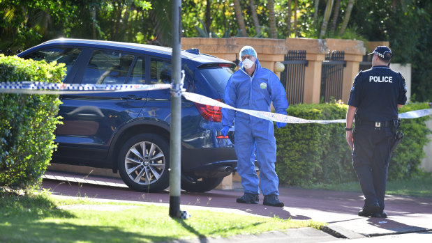 Scientific officers swarmed Dr Zeng's home on Tuesday morning.